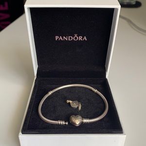 Silver Pandora bracelet with graduation cap charm